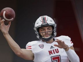 Northern Illinois quarterback Daniel Santacaterina (7) warms up before an NCAA college football game against Nebraska in Lincoln, Neb., Saturday, Sept. 16, 2017. (AP Photo/Nati Harnik)