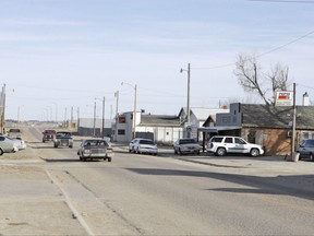 FILE - This March 6, 2006 file photo shows the unincorporated town of Whiteclay, Neb. The Nebraska Supreme Court on Friday, Sept. 29, 2017, rejected a last-ditch effort to resume beer sales in a tiny village next to an American Indian reservation in South Dakota that is plagued by alcohol problems. The court's ruling upholds an April decision by state regulators not to renew the licenses of four beer stores in Whiteclay, Neb/ (AP Photo/Nati Harnik, File)