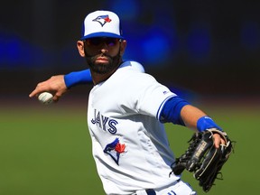 Jose Bautista warms up before facing the New York Yankees on Sept. 24.