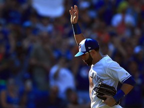 Toronto Blue Jays outfielder Jose Bautista salutes the crowd as he leaves the field in the ninth inning against the New York Yankees on Sept. 24, 2017.