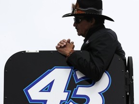Racing legend Richard Petty watches practice prior to car qualifying for the NASCAR Cup Series auto race at New Hampshire Motor Speedway in Loudon, N.H., Friday, Sept. 22, 2017. (AP Photo/Charles Krupa))