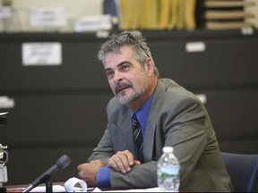 FILE - In this Thursday, July 6, 2017, file photo, John Cramsey, who was pulled over outside the Holland Tunnel and found to be carrying a cache of guns last year and charged, listens during a hearing at the Hudson County Courthouse in Jersey City, N.J. Judge Sheila Venable has rejected probation for Cramsey and ruled Friday, Sept. 22, 2017, that he should go to prison, saying his "armed vigilantism must be deterred." (Ed Murray/NJ Advance Media via AP, Pool, File)