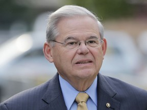 Sen. Bob Menendez arrives to court for his federal corruption trial in Newark, N.J., Wednesday, Sept. 6, 2017.  The trial  will examine whether he lobbied for Florida ophthalmologist Dr. Salomon Melgen's business interests in exchange for political donations and gifts. Both have pleaded not guilty. (AP Photo/Seth Wenig)