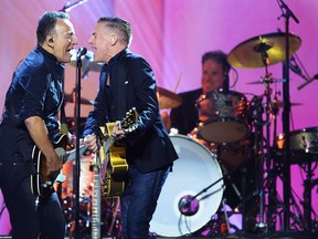 Bruce Springsteen and Bryan Adams perform during the closing ceremonies of the Invictus Games in Toronto on Saturday, September 30, 2017. THE CANADIAN PRESS/Nathan Denette