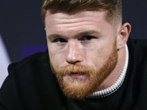 Canelo Alvarez attends a news conference Wednesday, Sept. 13, 2017, in Las Vegas. Alvarez is scheduled to fight Gennady Golovkin in a middleweight title fight Saturday in Las Vegas. (AP Photo/John Locher)