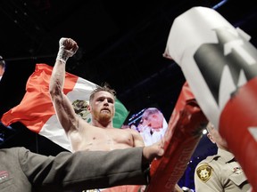 Canelo Alvarez reacts after his fight against Gennady Golovkin during a middleweight title fight Sunday, Sept. 17, 2017, in Las Vegas. The fight was called a draw. (AP Photo/John Locher)