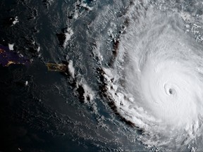 In this geocolor image captured by GOES-16  and released by the National Oceanic and Atmospheric Administration (NOAA), Hurricane Irma, a potentially catastrophic category 5 hurricane, moves westward, Tuesday morning, Sept. 5, 2017, in the Atlantic Ocean toward the Leeward Islands.