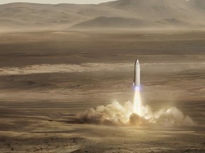 This artist's rendering made available by Elon Musk on Friday, Sept. 29, 2017 shows SpaceX's new mega-rocket design on Mars. With the 350-foot-tall spacecraft, Musk announced that his private space company aims to launch two cargo missions to the red planet in 2022. (SpaceX via AP)