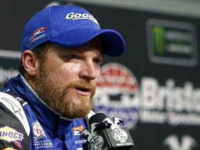 FILE - In this Aug. 17, 2017, file photo, NASCAR driver Dale Earnhardt Jr. speaks during a press conference at Bristol Motor Speedway in Bristol, Tenn. Earnhardt is preparing for the end of his NASCAR career and understands it likely won't finish the way he hoped when he returned from injury this season. (AP Photo/Wade Payne, File)