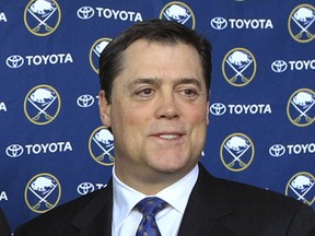 FILE - In this Jan. 9, 2014, file photo, Pat LaFontaine poses after a news conference in Buffalo N.Y. The NHL and NHL Players' Association have unveiled a "Declaration of Principles" to guide hockey culture across various levels of the sport. Hockey Hall of Famer Pat LaFontaine, now the league's vice president of hockey development, was a driver behind the process. (AP Photo/Nick LoVerde, File)
