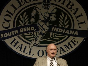 FILE - In this June 29, 2004, file photo, Purdue football coach Joe Tiller addresses the audience at the Gridiron Luncheon sponsored by the College Hall of Fame in South Bend, Ind. Tiller, the winningest football coach in Purdue history, died Saturday, Sept. 30, 2017, in Buffalo, Wyo., the school said. He was 74. (AP Photo/Joe Raymond, File)