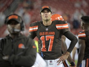 FILE - In this Aug. 26, 2017, file photo, Cleveland Browns quarterback Brock Osweiler (17) watches from the sideline during the second half of an NFL preseason football game against the Tampa Bay Buccaneers in Tampa, Fla. Osweiler is returning to Denver as the Broncos' backup quarterback. The Broncos agreed to terms with Peyton Manning's former apprentice Saturday, Sept. 2, on a one-year deal after he was cut by the Browns. Provided he passes his physical Monday, Osweiler will serve as Trevor Siemian's understudy in his second stint in Denver. (AP Photo/Phelan M. Ebenhack, File)