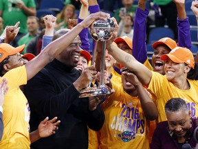 FILE - In this Oct. 20, 2016, file photo, Los Angeles Sparks players celebrate after winning the WNBA championship title with a 77-76 win over the Minnesota Lynx in Game 5 in Minneapolis. Last year's WNBA Finals were so good they're doing it all over again. The defending champion Los Angeles Sparks play the Minnesota Lynx, who are in the finals for the sixth time in the last seven years. Game 1 is on Sunday in Minneapolis. (AP Photo/Jim Mone, File)