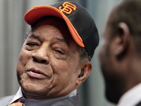 FILE - In this Jan. 21, 2011, file photo, former Major League baseball player Willie Mays listens during his appearance at the San Francisco Giants' 2010 World Series trophy display tour event at the Arthur Tappan School P.S. 46 in Harlem, New York. Baseball announced on Friday, Sept. 29, 2017, they have named its World Series Most Valuable Player award after Mays. (AP Photo/Bebeto Matthews, File)