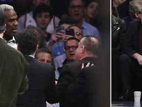 FILE - At left, in a Feb. 8, 2017, file photo, former New York Knicks player Charles Oakley, rear left, exchanges words with a security guard during the first half of an NBA basketball game between the Knicks and the Los Angeles Clippers, in New York. At right, also in a Feb. 8, 2017, file photo, Madison Square Garden Executive Chairman James Dolan watches the altercation. Oakley has sued the team's owners, saying he was defamed when they claimed he committed assault and was an alcoholic. The lawsuit details how Oakley was treated before and after he was forcefully removed from Madison Square Garden during a Feb. 8 game. The lawsuit filed Tuesday, Sept. 12, 2017, seeks unspecified damages.(AP Photo/Frank Franklin II, File)