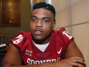 FILE - In this Aug. 5, 2017, file photo, Oklahoma's Orlando Brown speaks to the media during the an NCAA college football media day in Norman, Okla. Ohio State's game against Oklahoma on Saturday will feature two potential Heisman trophy candidates in quarterbacks J.T. Barrett and Baker Mayfield, but the marquee battle will be in the trenches when the Sooners have the ball. Oklahoma returned all five offensive line starters from last season's 11-2 team that ranked second in the nation in total offense _ including tackle Orlando Brown, the reigning Big 12 offensive lineman of the year.  (AP Photo/Sue Ogrocki, File)