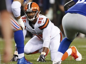 FILE - In this Aug. 21, 2017, file photo, Cleveland Browns defensive end Myles Garrett (95) plays against the New York Giants during the first half of an NFL preseason football game,in Cleveland. As he prepares for his NFL debut, Browns rookie Myles Garrett says he's viewing Steelers quarterback Ben Roethlisberger as "just another guy." The top overall pick isn't backing down from his comment after the draft that he plans to sack Big Ben when Cleveland opens the regular season on Sunday against the Pittsburgh Steelers. (AP Photo/Ron Schwane, File)