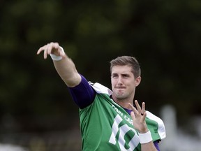 FILE - In this Aug. 4, 2017, file photo, East Carolina quarterback Thomas Sirk warms up during an NCAA college football practice in Greenville, N.C. Sirk will start at quarterback for East Carolina at West Virginia on Saturday after coming off the bench in a 34-14 loss to James Madison last week. (AP Photo/Gerry Broome, File)