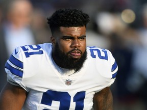 FILE - This is an Aug. 3, 2017, file photo showing Dallas Cowboys running back Ezekiel Elliott on the field prior to the Pro Football Hall of Fame NFL preseason game in Canton, Ohio. The NFL says Commissioner Roger Goodell was aware of one of his lead investigator's view that Ezekiel Elliott shouldn't be disciplined before the Dallas running back was suspended for six games in a domestic violence case. League spokesman Brian McCarthy on Friday, Sept. 1, 2017, disputed a key claim in a lawsuit filed by the players' union on behalf of Elliott seeking to vacate an upcoming ruling on an appeal. (AP Photo/David Richard, File)
