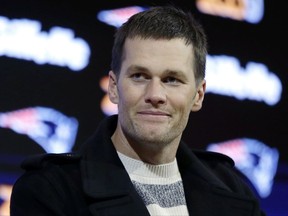FILE - In this Dec. 4, 2016, file photo, New England Patriots quarterback Tom Brady speaks to the media following an NFL football game against the Los Angeles Rams,in Foxborough, Mass. Tom Brady says in a television interview that he doesn't worry about concussions and considers them part of playing football. In an interview with CBS Sunday Morning, Brady says: "I'm not oblivious to them. I mean, I understand the risks that, you know, come with ... the physical nature of our game."(AP Photo/Elise Amendola, File)