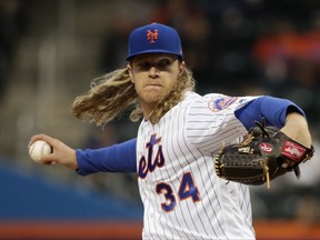 FILE - In this Thursday, April 20, 2017 file photo, New York Mets' Noah Syndergaard delivers a pitch during the first inning of a baseball game against the Philadelphia Phillies in New York. The Mets plan to have ace Noah Syndergaard make a one-inning start Saturday, Sept. 23, 2017 in his first major league game in nearly five months. (AP Photo/Frank Franklin II, File)