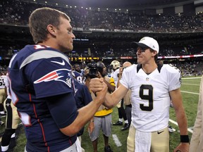 FILE - In this Aug. 22, 2015, file photo, New England Patriots quarterback Tom Brady, left, greets New Orleans Saints quarterback Drew Brees (9) after an NFL preseason football game in New Orleans. The Patriots and the Saints meet Sunday, Sept. 17, in New Orleans. (AP Photo/Bill Feig, File)