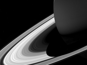 This Feb. 3, 2017 image made available by NASA shows Saturn's shadow on its rings as seen from the Cassini spacecraft. During its deliberate plunge Friday, Sept. 15, 2017, Cassini will keep sampling Saturn's atmosphere and beaming back data, until the spacecraft loses control and its antenna no longer points toward Earth. (NASA/JPL-Caltech/Space Science Institute via AP)