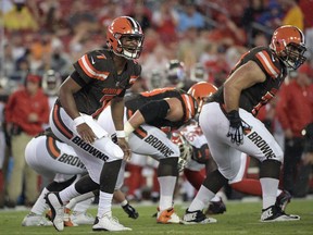 FILE - In this Aug. 26, 2017, file photo, Cleveland Browns quarterback DeShone Kizer (7) calls a play against the Tampa Bay Buccaneers during an NFL preseason football game in Tampa, Fla. Cleveland will hand its offense over to another rookie, quarterback DeShone Kizer, a second-round pick from Notre Dame. He's got the smarts, the pedigree and the arm. All that's missing is experience, and the Browns, who currently have two first-round picks next year, are going to quickly find out if he can handle the gig. (AP Photo/Phelan Ebenhack, File)