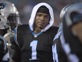 FILE - In this Aug. 24, 2017, file photo, Carolina Panthers quarterback Cam Newton (1) watches from the sideline during the first half of an NFL preseason football game against the Jacksonville Jaguars in Jacksonville, Fla. Newton played just one series in the preseason but the Panthers aren't worried about him heading into the season. (AP Photo/Phelan M. Ebenhack, File)