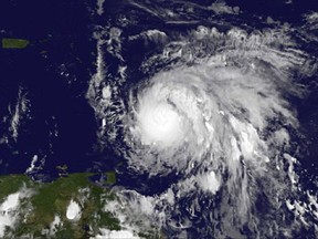 This Sunday, Sept. 17, 2017, GOES East satellite image provided by NASA taken at 7:45 p.m EDT, shows Hurricane Maria as it approaches the Lesser Antilles. Maria swiftly grew into a hurricane Sunday, and forecasters said it was expected to become much stronger over the coming hours following a path that would take it near many of the islands wrecked by Hurricane Irma and then on toward Puerto Rico, the Dominican Republic and Haiti. (NASA via AP)