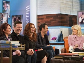 In this Monday, Sept. 25, 2017 photo, the cast of Will & Grace, from left, Megan Mullally, Sean Hayes, Debra Messing and Eric McCormack talk with Megyn Kelly on "Megyn Kelly TODAY" in New York. Kelly received backlash online after bringing a "Will & Grace" fan on and asking him if he was inspired to become gay and a lawyer because of McCormack's character, a gay attorney. Messing said she regrets her appearance on Kelly's new NBC daytime show. (Nathan Congleton/NBC via AP)