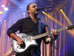 FILE - In this June 28, 2013, file photo, Dave Matthews of The Dave Matthews Band performs onstage at the Susquehanna Bank Center in Camden, N.J. The Dave Matthews Band, Justin Timberlake, Pharrell Williams and Ariana Grande will be among the performers at a free unity concert in Charlottesville on Sept. 24, 2017. (Photo by Owen Sweeney/Invision/AP, File)
