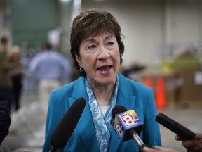 FILE - In this Thursday, Aug. 17, 2017, file photo, U.S. Sen. Susan Collins, R-Maine, speaks to members of the media while attending an event in Lewiston, Maine. Collins said Sunday, Sept. 24, she finds it "very difficult" to envision backing the last-chance GOP bill repealing the Obama health care law. That likely opposition leaves the Republican drive to fulfill one of the party's premier campaign promises dangling by a thread. (AP Photo/Robert F. Bukaty, File)