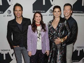 FILE - In this Sept. 23, 2017, file photo, the cast of "Will & Grace, from left, Eric McCormack, Megan Mullally, Debra Messing and Sean Hayes, attend a screening of the new season of the TV show during the Tribeca TV Festival at Cinepolis Chelsea in New York. The actors say they're grateful to be dusting off their "Will & Grace" characters for the series' unprecedented return to primetime on Thursday, Sept. 28. (Photo by Christopher Smith/Invision/AP, File)