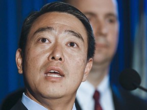 Acting U.S. Attorney for the Southern District of New York Joon H. Kim speaks during a press conference after announcing the arrest of four assistant basketball coaches from Arizona, Auburn, the University of Southern California and Oklahoma State on federal corruption charges, Tuesday, Sept. 26, 2017, in New York. (AP Photo/Bebeto Matthews)