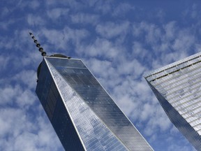 FILE - This Tuesday, Aug. 16, 2016, file photo shows One World Trade Center, left, and 7 World Trade Center, in New York. U.S. stocks slip away from record highs, Thursday, Sept. 14, 2017, as technology and health care companies sink, with prescription drug distributors taking some of the biggest losses. (AP Photo/Mark Lennihan, File)