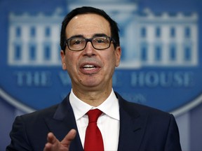 FILE - In this Friday, Aug. 25, 2017, file photo, Treasury Secretary Steven Mnuchin speaks during a news briefing at the White House in Washington. During a CNBC interview, Thursday, Aug. 31, 2017, Mnuchin avoided a direct answer when asked whether he supported the decision made by the Obama administration to replace Andrew Jackson on the $20 bill with Harriet Tubman, the 19th century African-American abolitionist who was a leader in the Underground Railroad. Mnuchin's response raised speculation that Tubman's future on the $20 bill could be in jeopardy. (AP Photo/Carolyn Kaster, File)