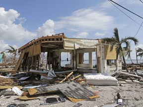 Debris surrounds a destroyed structure in the aftermath of Hurricane Irma, Wednesday, Sept. 13, 2017, in Big Pine Key, Fla. Anyone who suffered damage from hurricanes Harvey or Irma will be thankful if they have homeowners or windstorm coverage and flood insurance. But much work lies ahead. Filing claims for major damage can be a full-time job because you must document every loss and negotiate a fair settlement. Omissions and missteps you make can mean a lower payout. (AP Photo/Alan Diaz)