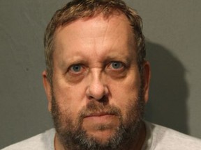 This booking photo provided by the Chicago Police Department shows Andrew Warren on Saturday, Aug. 19, 2017. Warren, an Oxford University financial officer, and Wyndham Lathem, a Northwestern University professor, have been charged with first-degree murder in the death of Trenton James Cornell-Duranleau, a Michigan native who had been working in Chicago. Authorities say Cornell-Duranleau suffered more than 40 stab wounds to his upper body during the July attack in Lathem's high-rise Chicago condo. Lathem and Warren surrendered peacefully to police in California on Aug. 4 after an eight-day manhunt. (Chicago Police Department via AP)
