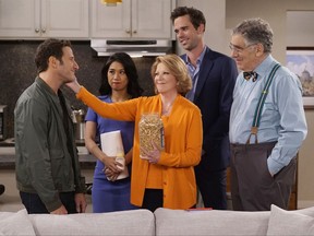 This image released by CBS shows, from left, Mark Feuerstein, Liza Lapira, Linda Lavin, David Walton and Elliott Gould in a scene from the comedy series, "9JKL," premiering Oct. 2, on CBS. (Cliff Lipson/CBS via AP)
