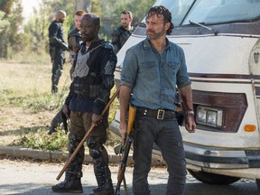 In this image released by AMC, Lennie James portrays Morgan Jones, left, and Andrew Lincoln portrays Rick Grimes in a scene from "The Walking Dead." The eighth season premieres on Oct. 22. (Gene Page/AMC via AP)