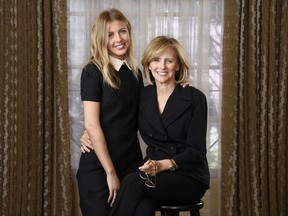 In this Aug. 24, 2017 photo, Hallie Meyers-Shyer, left, writer/director of the film "Home Again," poses for a portrait with her mother, the film's producer Nancy Meyers, at the Four Seasons Hotel in Los Angeles. The film hits theaters Friday, Sept. 8, and stars Reese Witherspoon as a recently separated mother of two who moves back to Los Angeles and starts dating a much younger man. (Photo by Chris Pizzello/Invision/AP)