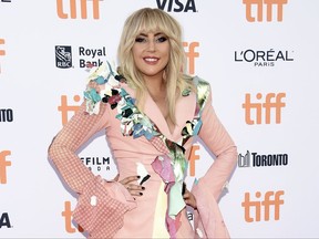 FILE - In this sept. 8, 2017 file photo, Lady Gaga attends a premiere for "Gaga: Five Foot Two" at the Toronto International Film Festival in Toronto. Lady Gaga has been hospitalized and forced to pull out of the upcoming Rock in Rio music festival in Brazil, citing "severe physical pain" and posting a photo of what resembles an IV in her arm. (Photo by Evan Agostini/Invision/AP, File)