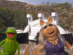 This image released by the Los Angeles Philharmonic Association and The Muppets shows characters Kermit the Frog, left, and Miss Piggy during a media availability at The Hollywood Bowl in Los Angeles to promote their first full-length live stage performance. he Muppets begin their three-night run at the Hollywood Bowl on Friday night. (Los Angeles Philharmonic Association and The Muppets via AP)
