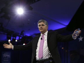 FILE - In this March 4, 2016, file photo, Sean Hannity of Fox News arrives in National Harbor, Md. More than a month after a liberal advocacy group publicly called on advertisers to boycott Sean Hannity's show on Fox News Channel, the luxury car maker Cadillac has been the only new company to publicly back away from the program. (AP Photo/Carolyn Kaster, File)