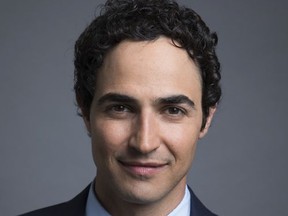 This July 31, 2017 photo shows Zac Posen posing for a photo to promote his new documentary, "House of Z" in New York. (Photo by Amy Sussman/Invision/AP)