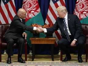 President Donald Trump shakes hands with Afghan President Ashraf Ghani at the Palace Hotel during the United Nations General Assembly, Thursday, Sept. 21, 2017, in New York. (AP Photo/Evan Vucci)
