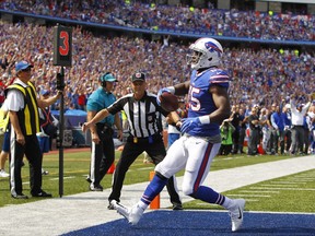 Buffalo Bills tight end Charles Clay (85) scores a touchdown after catching a pass from quarterback Tyrod Taylor during the first half of an NFL football game against the New York Jets, Sunday, Sept. 10, 2017, in Orchard Park, N.Y. (AP Photo/Jeffrey T. Barnes)