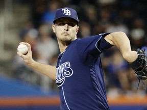 Tampa Bay Rays' Jake Odorizzi delivers a pitch during the first inning of a baseball game against the New York Yankees, Monday, Sept. 11, 2017, in New York. The Yankees will be the visiting team for the series moved from St. Petersburg, Florida, because of Hurricane Irma. (AP Photo/Frank Franklin II)