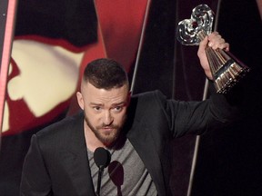 FILE - In this March 5, 2017, file photo, Justin Timberlake accepts the award for song of the year for "Can't Stop The Feeling!" at the iHeartRadio Music Awards at the Forum in Inglewood, Calif. Timberlake, U2, Cate Blanchett and Salma Hayek are among the stars joining an hour-long live television special about reinventing American high schools. Organizers announced Thursday, Sept. 7, that Kelly Clarkson has also been added as a performer to the star-studded "EIF Presents: XQ Super School Live" show. (Photo by Chris Pizzello/Invision/AP, File)